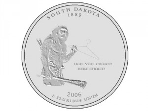 New South Dakota state quarter depicts a caveman holding a hanger to indicate the only choice for women who may want to terminate a pregnancy