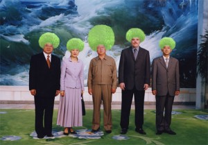 North Korean dictator, Kim Jong Il, enforces his new policy where every citizen must wear the same hairdo as the illustrious leader...no matter what.